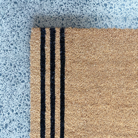 natural coir doormat with blacks stripes
